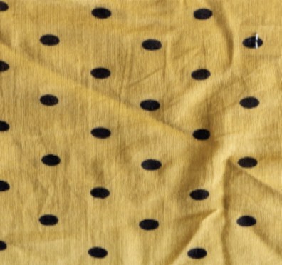 Mustard yellow with black polka dots